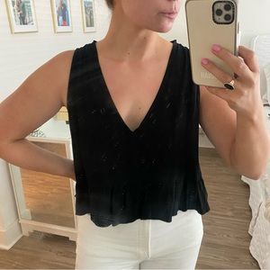 Lulu’s black tank top with ruffle bottom